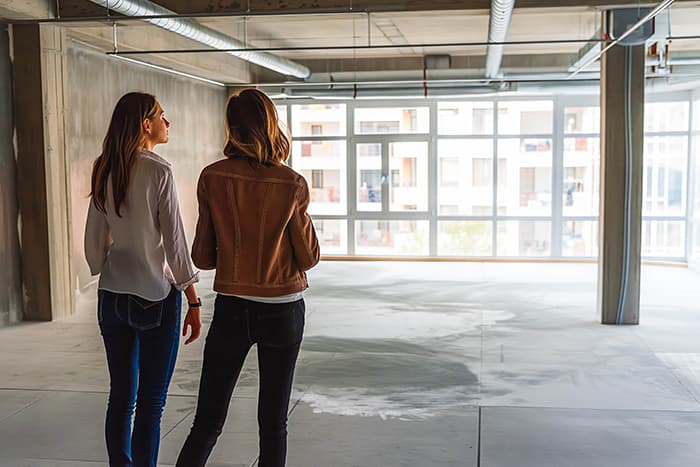 two women viewing a commercial property
