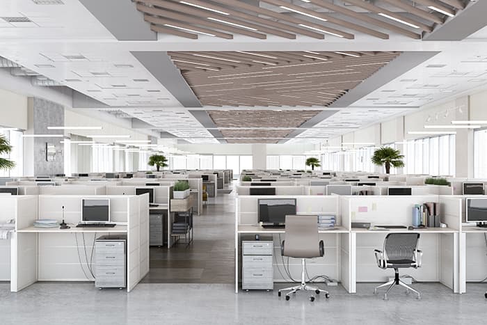 Interior of a large office space with many cubicles