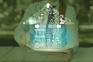 A visual of debt relief with a person in the background at a desk
