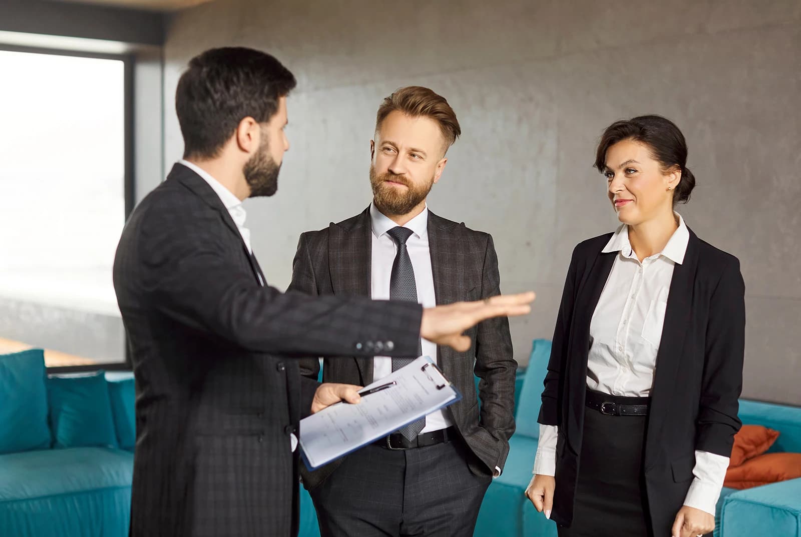 three people discussing a commercial property
