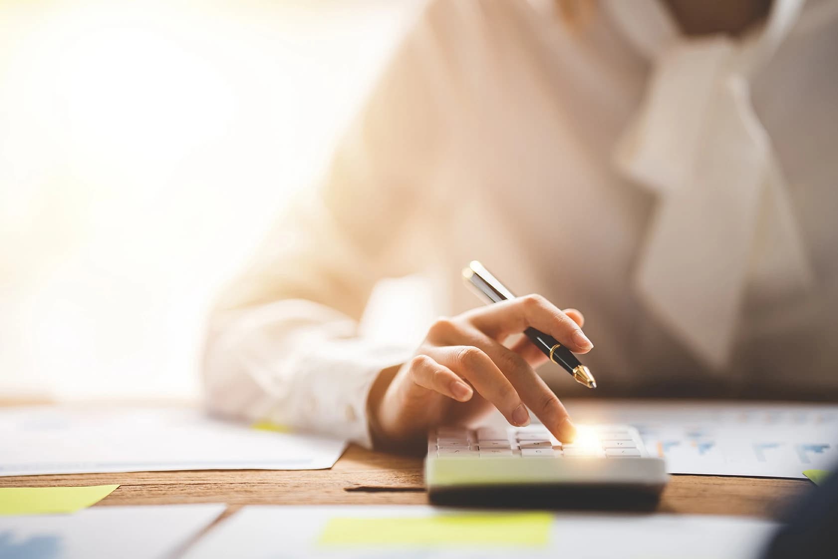 woman using a calculator