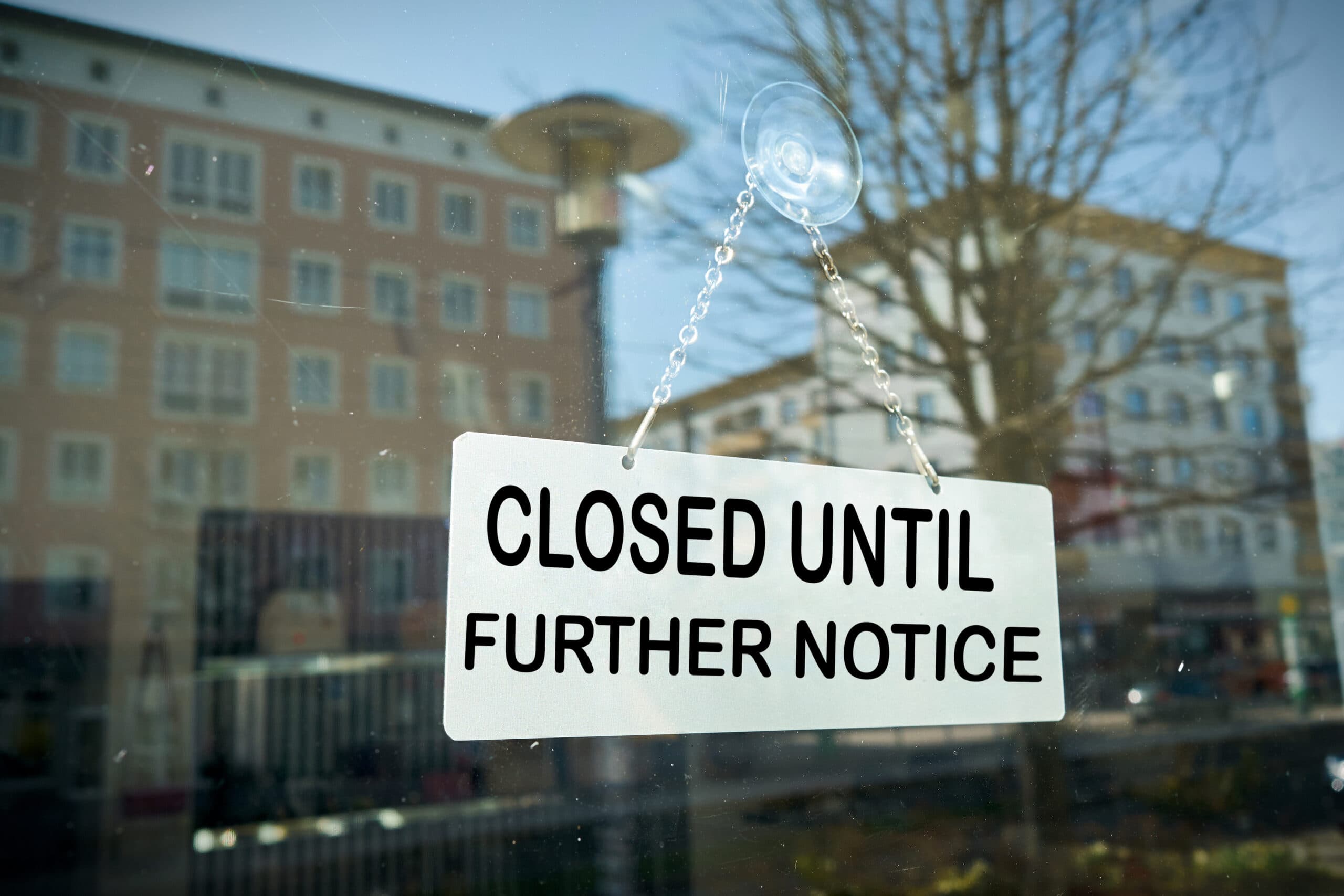 a sign on the door that says closed until further notice