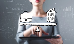 Image of woman with a graphic balancing a briefcase and a home in front of her.